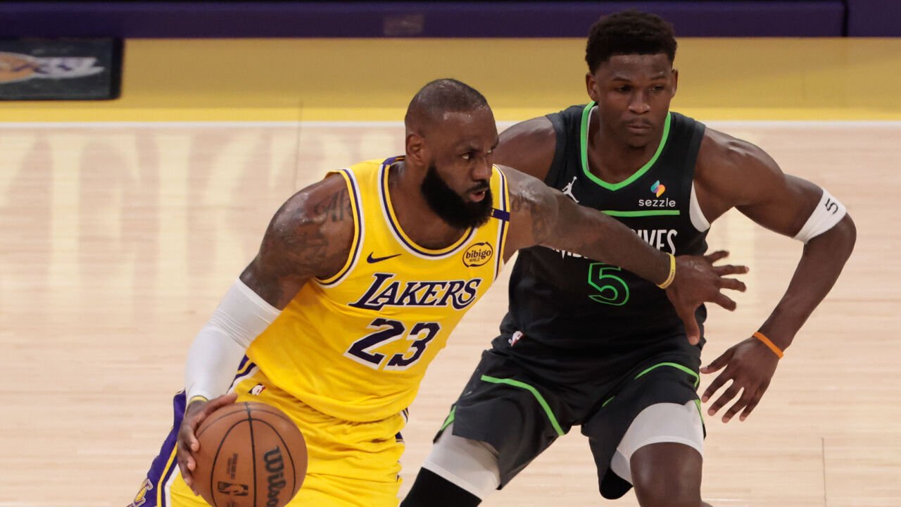 LOS ANGELES, CA - APRIL 30: Los Angeles Lakers forward LeBron James (23) looks to get past Minnesota Timberwolves guard Anthony Edwards (5) during game 5 of the first round of the NBA Western Conference Playoffs between the Minnesota Timberwolves and the Los Angeles Lakers on April 30, 2025, at Crypto.com Arena in Los Angeles, CA.