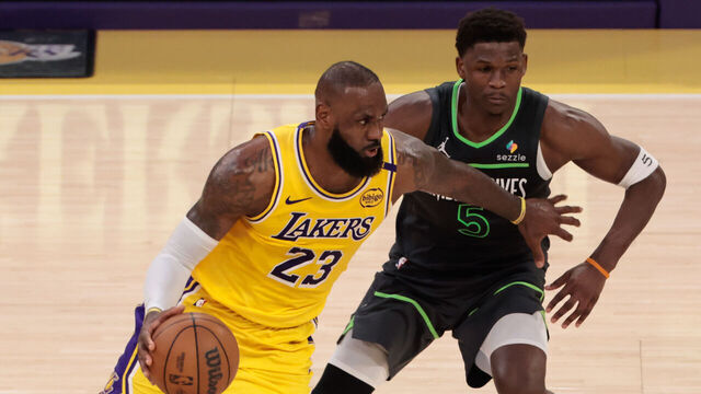 LOS ANGELES, CA - APRIL 30: Los Angeles Lakers forward LeBron James (23) looks to get past Minnesota Timberwolves guard Anthony Edwards (5) during game 5 of the first round of the NBA Western Conference Playoffs between the Minnesota Timberwolves and the Los Angeles Lakers on April 30, 2025, at Crypto.com Arena in Los Angeles, CA.