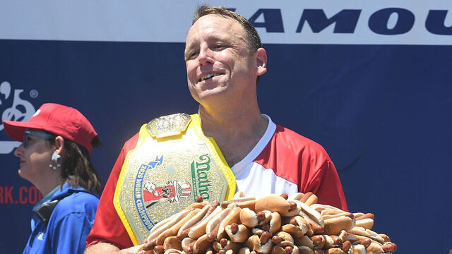NEW YORK, NY - JULY 04: Joey Chestnut wins the 2025 Nathan's Famous International Hot Dog Eating Contest eating 70.5 hot dogs at Coney Island on July 4, 2025 in New York City.