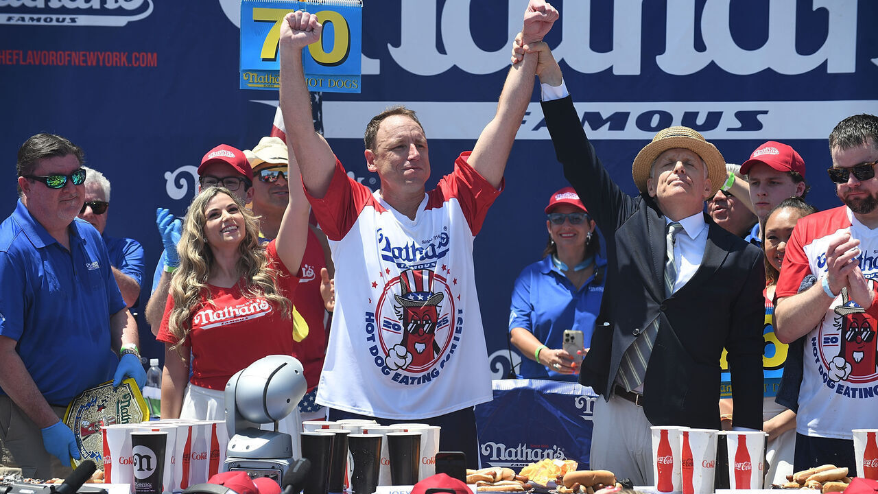 NEW YORK, NY - JULY 04: Joey Chestnut wins the 2025 Nathan's Famous International Hot Dog Eating Contest eating 70.5 hot dogs at Coney Island on July 4, 2025 in New York City.