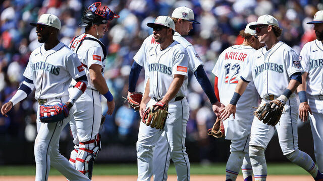 SEATTLE, WASHINGTON - JULY 04: The Seattle Mariners celebrate after beating the Toronto Blue Jays 11-0 at T-Mobile Park on July 04, 2026 in Seattle, Washington.