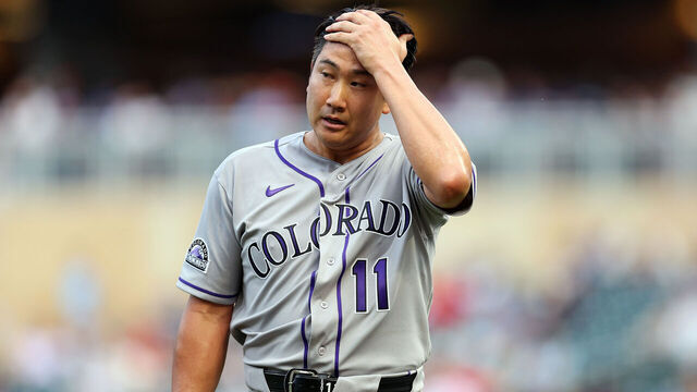 MINNEAPOLIS, MINNESOTA - JUNE 26: Tomoyuki Sugano #11 of the Colorado Rockies reacts as he exits the field after pitching to the Minnesota Twins in the second inning at Target Field on June 26, 2026 in Minneapolis, Minnesota.