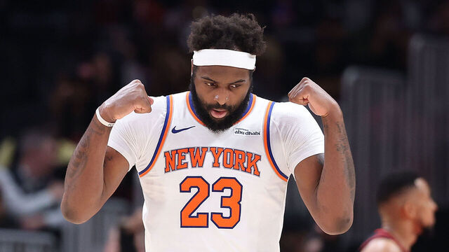 ATLANTA, GEORGIA - APRIL 06: Mitchell Robinson #23 of the New York Knicks reacts after a basket against the Atlanta Hawks during the fourth quarter at State Farm Arena on April 06, 2026 in Atlanta, Georgia.