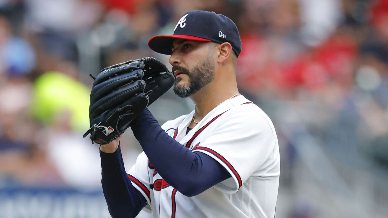 ATLANTA, GEORGIA - JUNE 30: Martin Perez #33 of the Atlanta Braves reacts during the second inning against the St. Louis Cardinals at Truist Park on June 30, 2026 in Atlanta, Georgia.