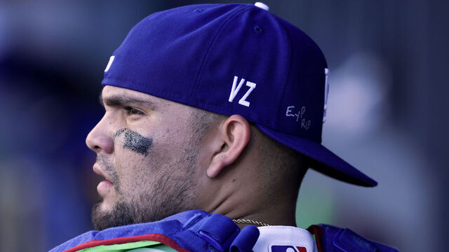 LOS ANGELES, CALIFORNIA - JULY 05: Eliezer Alfonzo #64 of the Los Angeles Dodgers stands in the dugout during the fourth inning against the San Diego Padres at Dodger Stadium on July 05, 2026 in Los Angeles, California.
