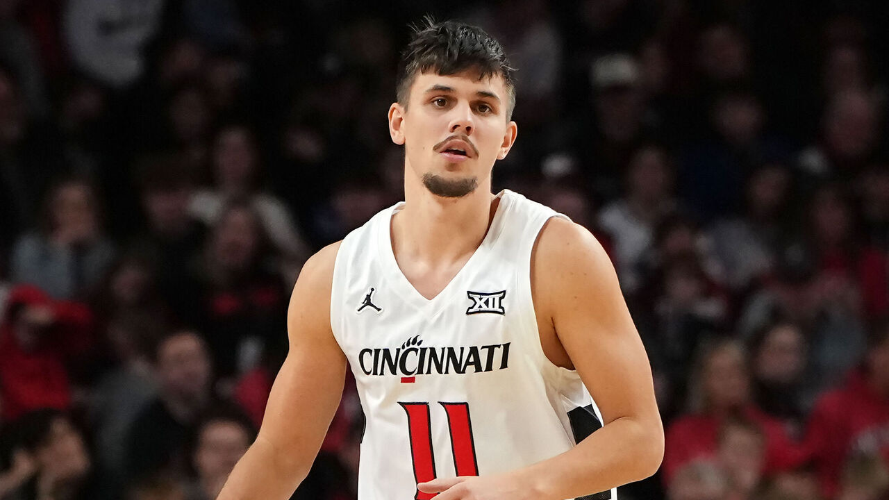 CINCINNATI, OHIO - DECEMBER 29: Kerr Kriisa #11 of the Cincinnati Bearcats dribbles the ball in the first half against the Lipscomb Bison at Fifth Third Arena on December 29, 2025 in Cincinnati, Ohio.