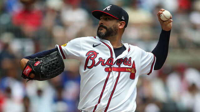 ATLANTA, GEORGIA - JULY 5: Martin Perez #33 of the Atlanta Braves pitches against the New York Mets in the first inning at Truist Park on July 5, 2026 in Atlanta, Georgia.