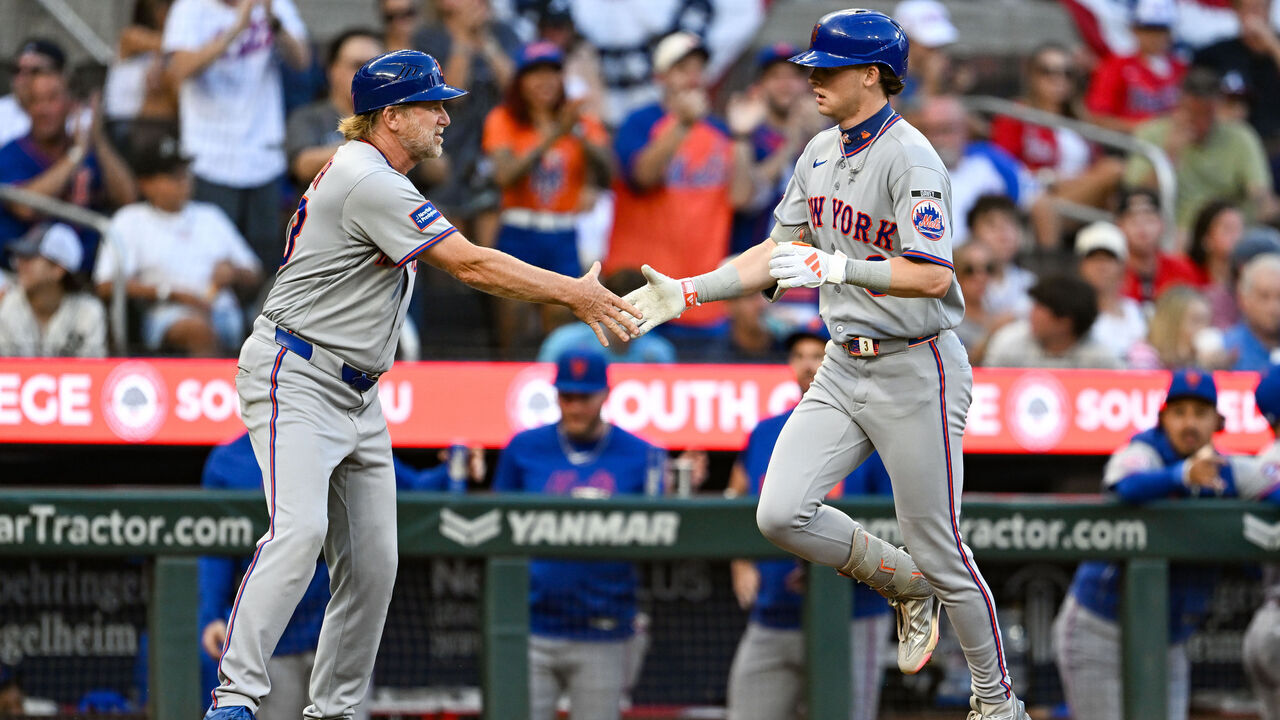 ATLANTA, GA - JULY 06: New York third base coach Tim Leiper (63) congratulates right fielder Carson Benge (3) after he hit a solo home run during the MLB game between the New York Mets and the Atlanta Braves on July 6th, 2026 at Truist Park in Atlanta, GA.