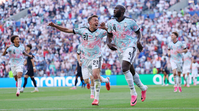 SEATTLE, WASHINGTON - JULY 06: Romelu Lukaku #9 of Belgium celebrates with Timothy Castagne #21 after scoring the team's fourth goal during the FIFA World Cup 2026 Round of 16 match between USA and Belgium at Seattle Stadium on July 06, 2026 in Seattle, Washington.