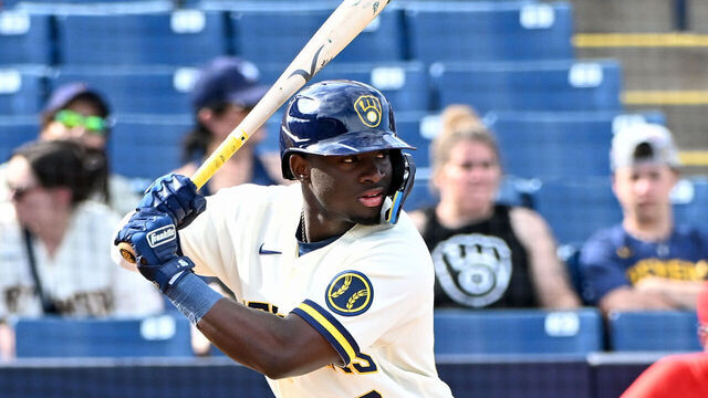 PHOENIX, ARIZONA - FEBRUARY 28, 2026: Luis Lara #89 of the Milwaukee Brewers bats during the sixth inning of a spring training game against the Cincinnati Reds at American Family Fields of Phoenix on February 28, 2026 in Phoenix, Arizona.