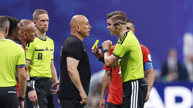 ATLANTA, GEORGIA - JULY 07: Referee Francois Letexier shows a yellow card to Hossam Hassan, Head Coach of Egypt, during the FIFA World Cup 2026 Round of 16 match between Argentina and Egypt at Atlanta Stadium on July 07, 2026 in Atlanta, Georgia.
