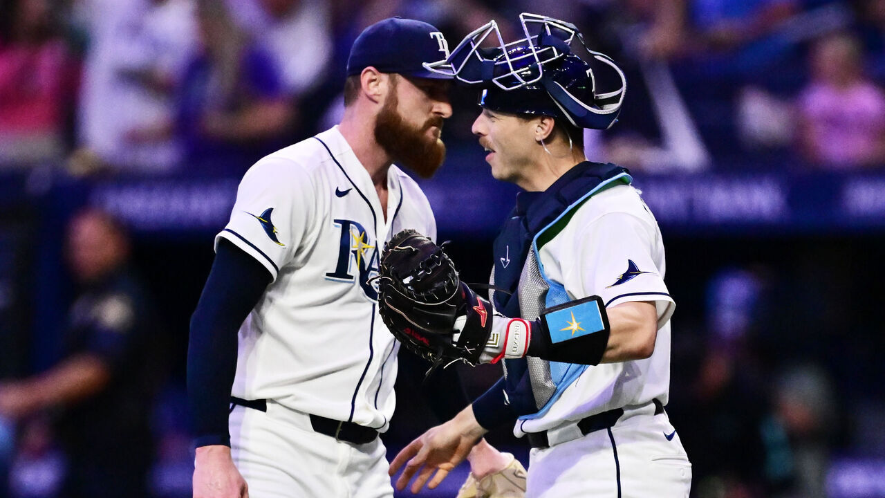 ST PETERSBURG, FLORIDA - JULY 07: Bryan Baker #47 celebrates with Hunter Feduccia #9 of the Tampa Bay Rays after defeating the New York Yankees 6-4 at Tropicana Field on July 07, 2026 in St Petersburg, Florida.