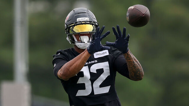 HOUSTON, TEXAS - JUNE 04: David Montgomery #32 of the Houston Texans catches a pass during OTA Offseason Workouts at Houston Methodist Training Center on June 04, 2026 in Houston, Texas.