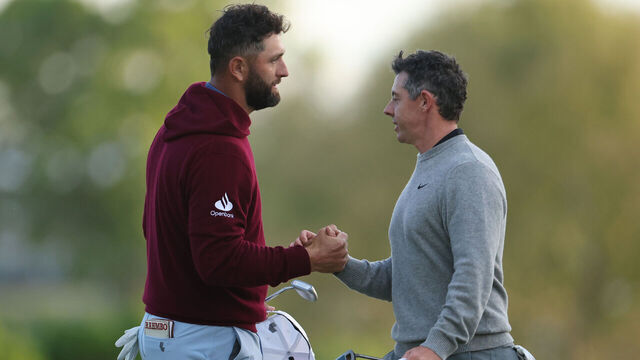 NEWTOWN, PENNSYLVANIA - MAY 15: Jon Rahm of Spain and Rory McIlroy of Northern Ireland shake hands on the 18th green during the second round of the PGA Championship at Aronimink Golf Club on May 15, 2026 in Newtown, Pennsylvania.