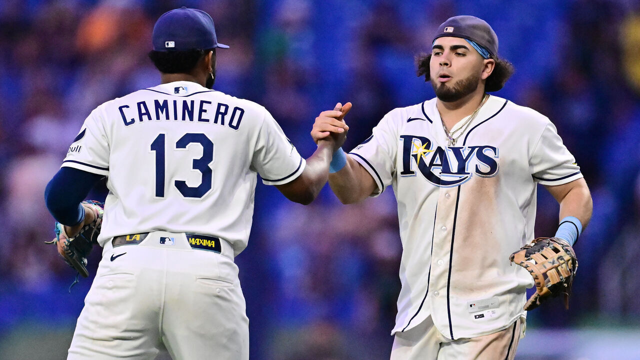 ST PETERSBURG, FLORIDA - JULY 08: (L-R) Junior Caminero #13 of the Tampa Bay Rays celebrates with Jonathan Aranda #8 after defeating the New York Yankees 3-0 at Tropicana Field on July 08, 2026 in St Petersburg, Florida.