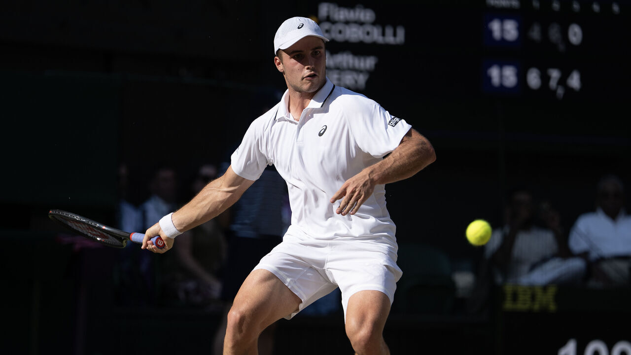 LONDON, ENGLAND - JULY 8: Arthur Fery in action during his quarter-final match against Flavio Cobolli on day ten of The Championships Wimbledon 2026 at All England Lawn Tennis and Croquet Club on July 8, 2026 in London, England.