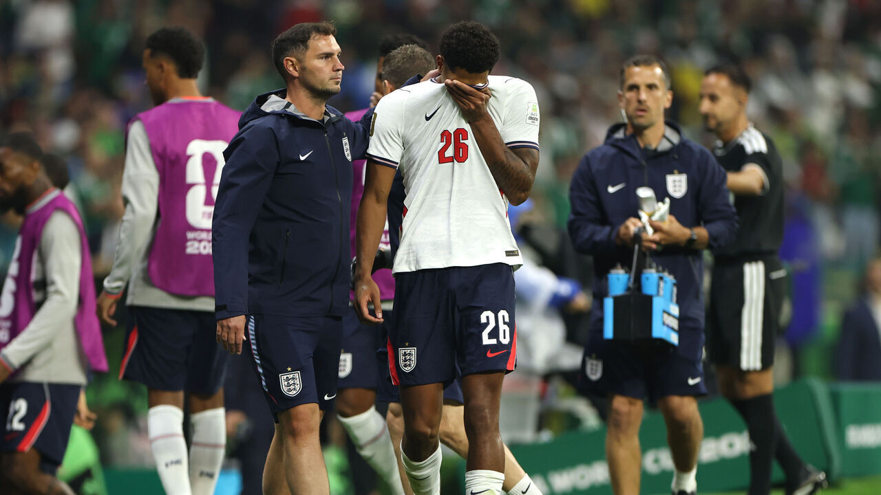 MEXICO CITY, MEXICO - JULY 05: Jarell Quansah #26 of England reacts after receiving a red card on a tackle against Jesus Gallardo #23 of Mexico during the FIFA World Cup 2026 Round of 16 match between Mexico and England at Mexico City Stadium on July 05, 2026 in Mexico City, Mexico.