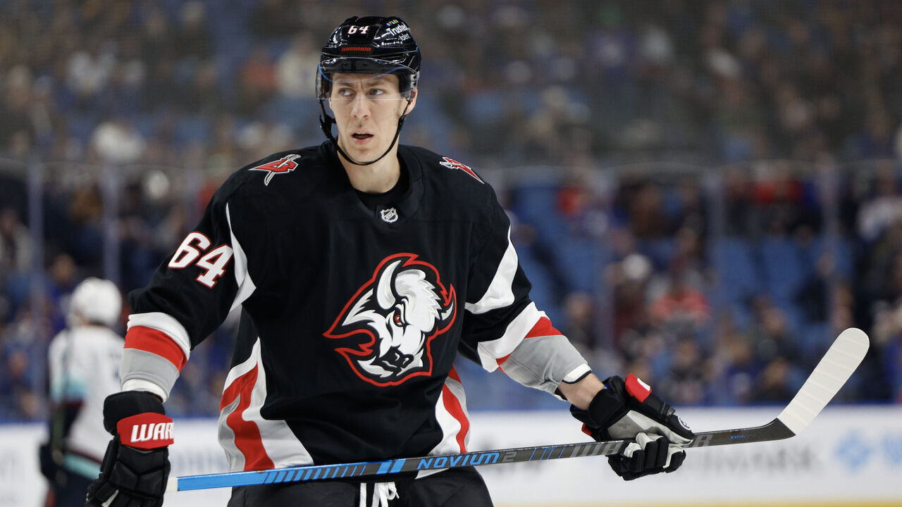 BUFFALO, NEW YORK - MARCH 28: Logan Stanley #64 of the Buffalo Sabres skates during the second period against the Seattle Kraken at KeyBank Center on March 28, 2026 in Buffalo, New York.