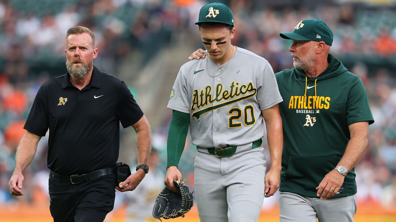 DETROIT, MICHIGAN - JULY 09: Zack Gelof #20 of the Athletics leaves the game after crashing into the wall in foul territory making a catch during the third inning against the Detroit Tigers at Comerica Park on July 09, 2026 in Detroit, Michigan.