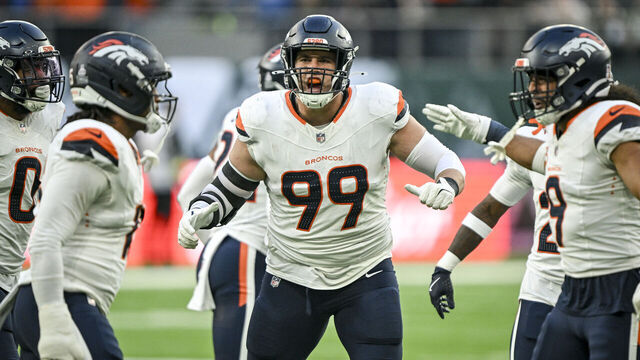 LONDON , ENGLAND - OCTOBER 12: Zach Allen (99) of the Denver Broncos roars after Nik Bonitto (15) sacked Justin Fields (7) of the New York Jets during the fourth quarter of the Broncos' 13-11 win at Tottenham Hotspur Stadium in London on Sunday, October 12, 2025.