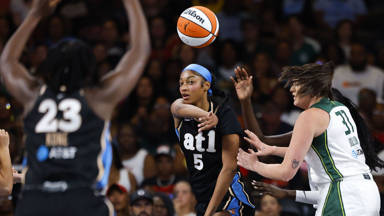 COLLEGE PARK, GEORGIA - JULY 9: Angel Reese #5 of the Atlanta Dream passes to Sika Kone #23 during the first quarter against the Seattle Storm at Gateway Center Arena on July 9, 2026 in College Park, Georgia.