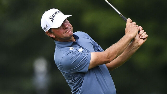 LOUISVILLE, KENTUCKY - JULY 10: Lucas Glover of the United States hits an approach shot on the 18th hole during the second round of the ISCO Championship 2026 at Hurstbourne Country Club on July 10, 2026 in Louisville, Kentucky.