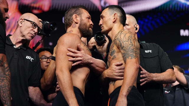 LAS VEGAS, NEVADA - JULY 10: (L-R) Conor McGregor and Max Holloway face off during the UFC 329 ceremonial weigh-in at T-Mobile Arena on July 10, 2026 in Las Vegas, Nevada.
