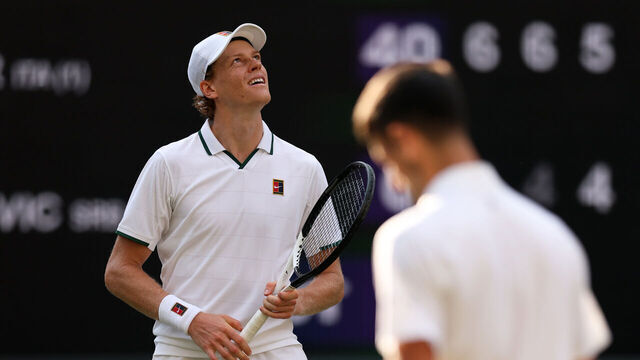 LONDON, ENGLAND - JULY 10: Jannik Sinner of Italy walks to the net after winning match point against Novak Djokovic of Serbia during their Gentlemen's Singles semifinal match on day twelve of The Championships Wimbledon 2026 at All England Lawn Tennis and Croquet Club on July 10, 2026 in London, England.