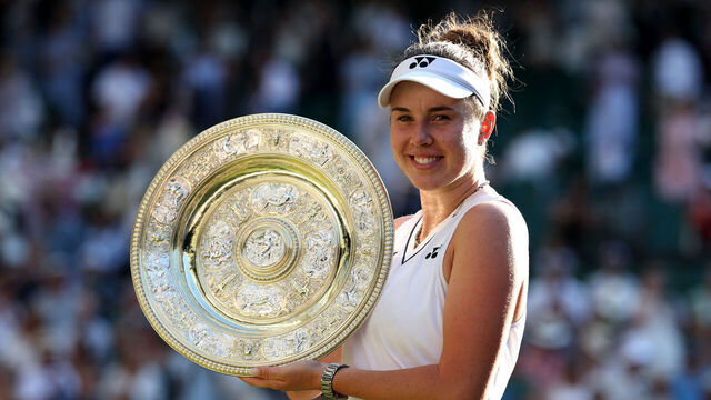 LONDON, ENGLAND - JULY 11: Linda Noskova of Czechia poses for a photo with the Venus Rosewater Dish after victory against Karolina Muchova of Czechia in their Ladies' Singles final match on day thirteen of The Championships Wimbledon 2026 at All England Lawn Tennis and Croquet Club on July 11, 2026 in London, England.