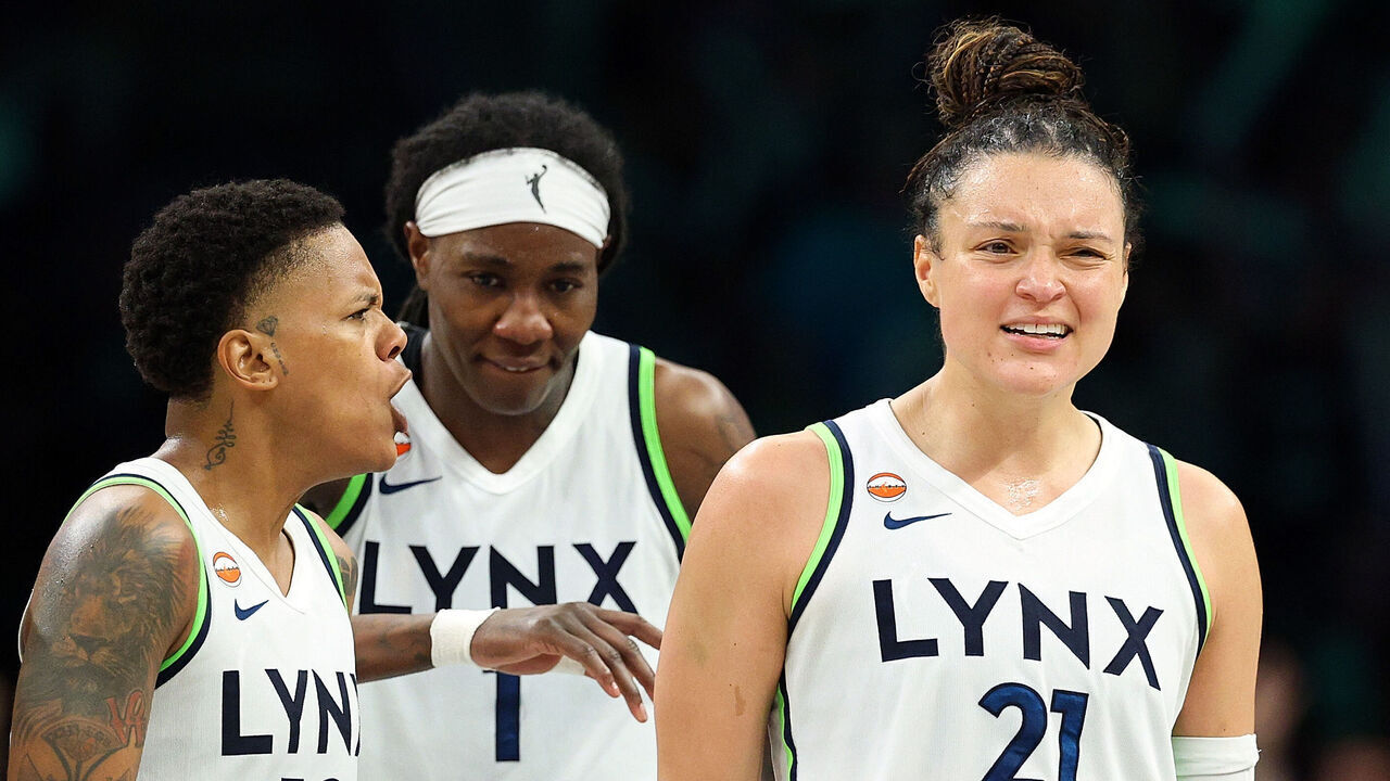 MINNEAPOLIS, MINNESOTA - JULY 11: Kayla McBride #21 of the Minnesota Lynx celebrates her three-point basket against the New York Liberty with teammates in the fourth quarter at Target Center on July 11, 2026 in Minneapolis, Minnesota. The Lynx defeated the Liberty 90-85.
