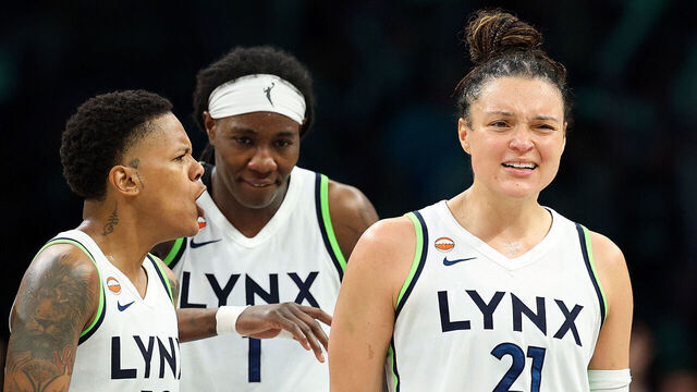 MINNEAPOLIS, MINNESOTA - JULY 11: Kayla McBride #21 of the Minnesota Lynx celebrates her three-point basket against the New York Liberty with teammates in the fourth quarter at Target Center on July 11, 2026 in Minneapolis, Minnesota. The Lynx defeated the Liberty 90-85.