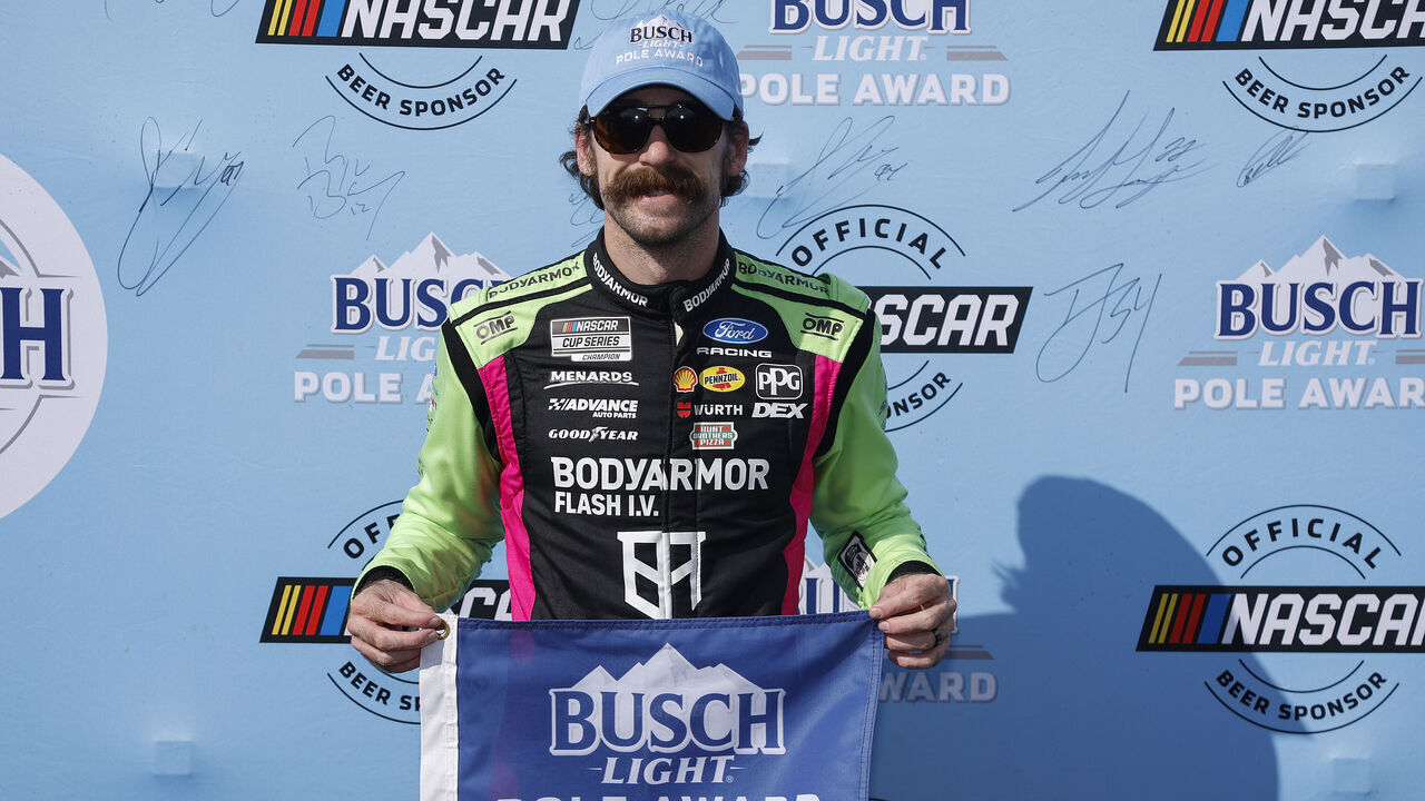 HAMPTON, GEORGIA - JULY 11: Ryan Blaney, driver of the #12 BODYARMOR FLASH I.V. Ford, poses for photos after winning the pole award during qualifying for the NASCAR Cup Series Quaker State 400 Available at Walmart at EchoPark Speedway on July 11, 2026 in Hampton, Georgia.