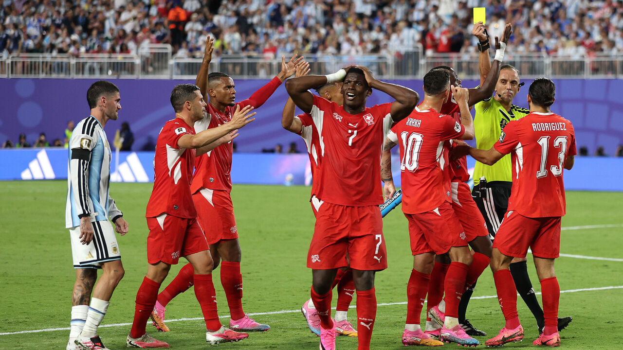 KANSAS CITY, MISSOURI - JULY 11: Referee Joao Pinheiro shows a second yellow and subsequent red card to Breel Embolo #7 of Switzerland during the FIFA World Cup 2026 Quarter Final match between Argentina and Switzerland at Kansas City Stadium on July 11, 2026 in Kansas City, Missouri.