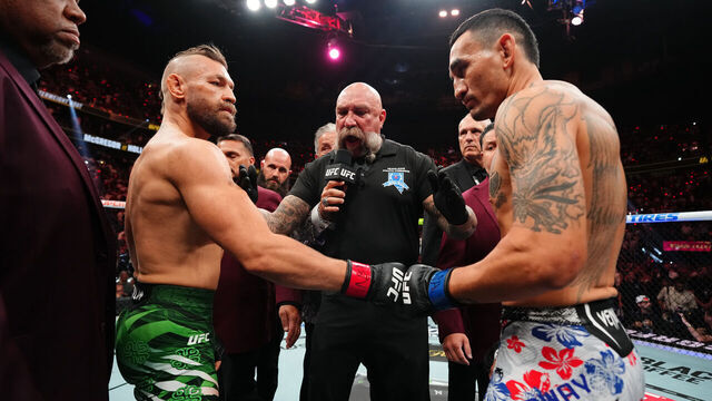 LAS VEGAS, NEVADA - JULY 11: (L-R) Conor McGregor of Ireland touches gloves with Max Holloway in a welterweight fight during the UFC 329 event at T-Mobile Arena on July 11, 2026 in Las Vegas, Nevada.