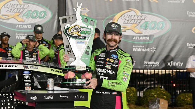 ATLANTA, GA - JULY 12: Ryan Blaney (#12 Team Penske Body Armor Flash I.V. Ford) celebrates in Victory Lane during the running of the NASCAR Cup Series Quaker State 400 on July 12, 2026, at EchoPark Speedway in Hampton, GA.
