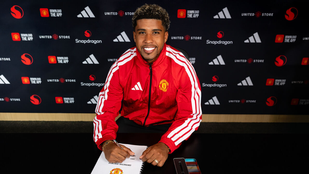 MANCHESTER, ENGLAND - JULY 13: (EXCLUSIVE COVERAGE) Andrey Santos of Manchester United poses after signing for the club at Carrington Training Ground on July 13, 2026 in Manchester, England.