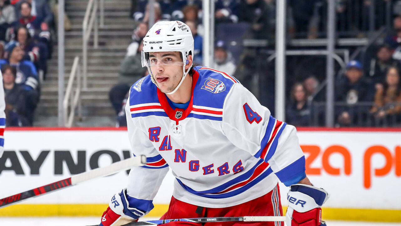 WINNIPEG, CANADA - MARCH 12: Braden Schneider #4 of the New York Rangers looks on during a first period stoppage in play against the Winnipeg Jets at the Canada Life Centre on March 12, 2026 in Winnipeg, Manitoba, Canada. The Rangers defeated the Jets 6-3.