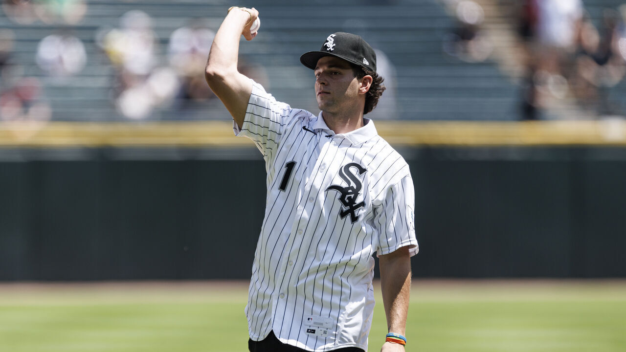 CHICAGO, ILLINOIS - JULY 12: Chicago White Sox 2026 Draft Pick Roch Cholowsky delivers a ceremonial first pitch before a game between the Athletics and the Chicago White Sox at Rate Field on July 12, 2026 in Chicago, Illinois.
