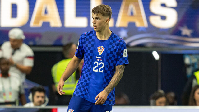 ARLINGTON, TEXAS - JUNE 17: Luka Vukovi #22 of Croatia moves with the ball during the FIFA World Cup 2026 Group L match between England and Croatia at Dallas Stadium on June 17, 2026 in Arlington, Texas.