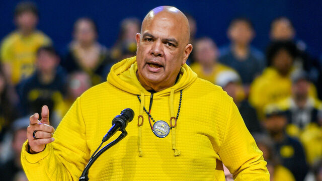 ANN ARBOR, MICHIGAN - APRIL 11: University of Michigan Athletic Director Warde Manuel speaks on stage during the Michigan Men's Basketball National Championship celebration at Crisler Arena on April 11, 2026 in Ann Arbor, Michigan.