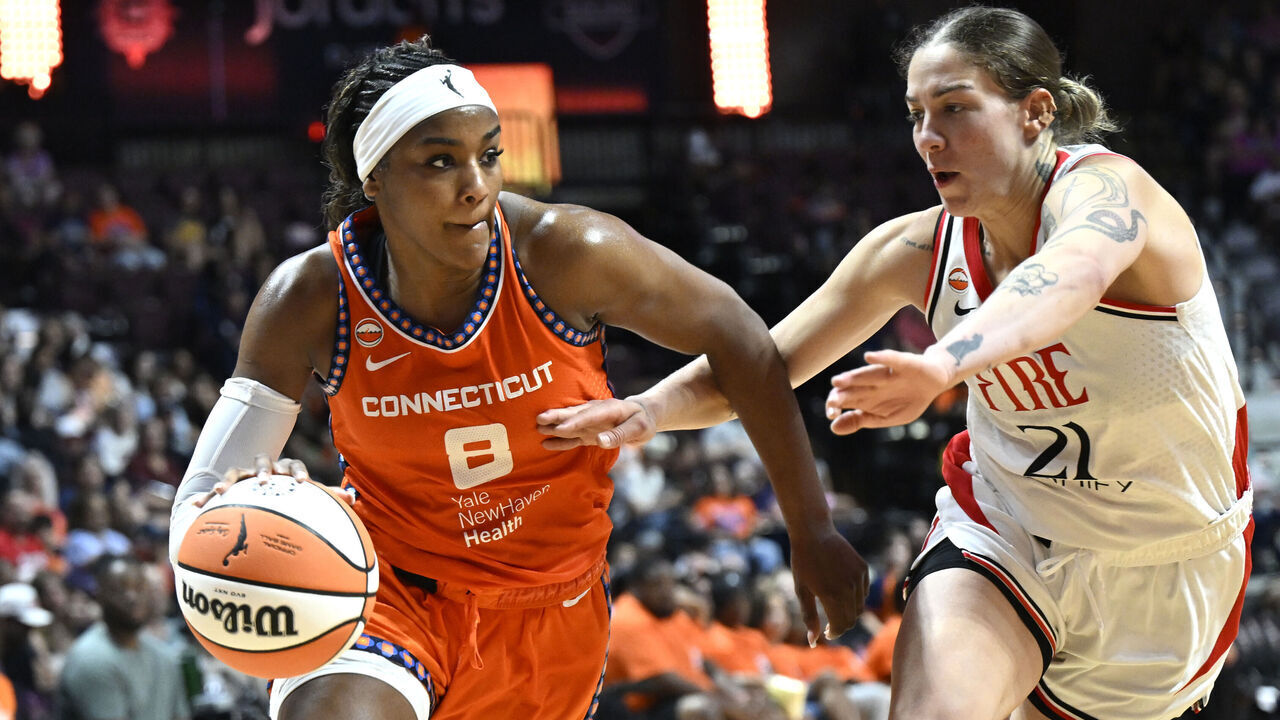 UNCASVILLE, CT - JULY 14: Aaliyah Edwards #8 of the Connecticut Sun drives to the basket during the game against the Portland Fire on July 14, 2026 at the Mohegan Sun Arena in Uncasville, Connecticut. Mandatory Copyright Notice: Copyright 2026 NBAE