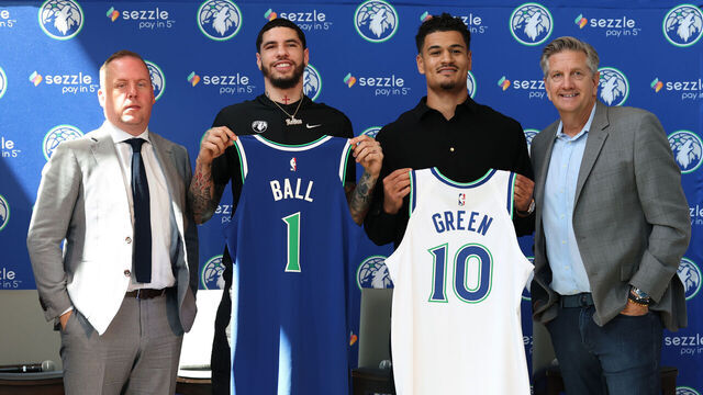 MINNEAPOLIS, MN - JULY 14: Tim Connelly President, LaMelo Ball #1, Josh Green #10, and Head Coach Chris Finch of the Minnesota Timberwolves poses for a photo during a press conference on July 14, 2026 at Target Center in Minneapolis, Minnesota. Mandatory Copyright Notice: Copyright 2026 NBAE