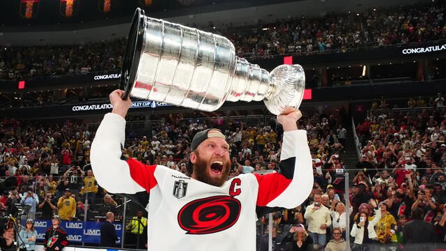 LAS VEGAS, NEVADA - JUNE 14: Jordan Staal #11 of the Carolina Hurricanes hoists the Stanley Cup after defeating the Vegas Golden Knights in Game Six of the 2026 NHL Stanley Cup Final between the Carolina Hurricanes and the Vegas Golden Knights at T-Mobile Arena on June 14, 2026 in Las Vegas, Nevada.