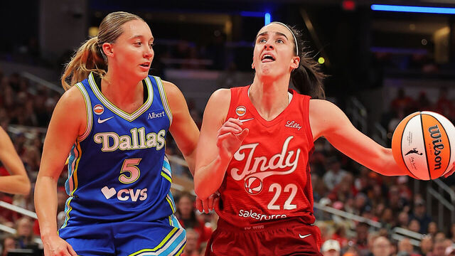 INDIANAPOLIS, IN - MAY 9: Caitlin Clark #22 of the Indiana Fever drives to the basket while guarded by Paige Bueckers #5 of the Dallas Wings on May 9, 2026 at the Gainbridge Fieldhouse inIndianapolis, Indiana. Mandatory Copyright Notice: Copyright 2026 NBAE