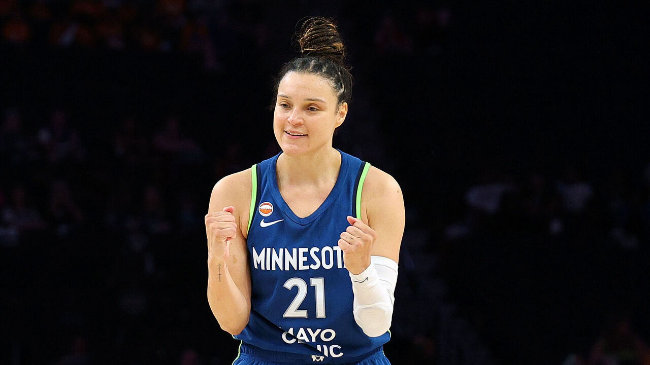 MINNEAPOLIS, MINNESOTA - JULY 15: Kayla McBride #21 of the Minnesota Lynx celebrates her three-point basket against the Los Angeles Sparks in the fourth quarter at Target Center on July 15, 2026 in Minneapolis, Minnesota. The Lynx defeated the Sparks 96-87.