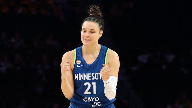 MINNEAPOLIS, MINNESOTA - JULY 15: Kayla McBride #21 of the Minnesota Lynx celebrates her three-point basket against the Los Angeles Sparks in the fourth quarter at Target Center on July 15, 2026 in Minneapolis, Minnesota. The Lynx defeated the Sparks 96-87.