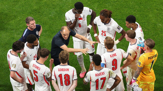 ATLANTA, GEORGIA - JULY 15: England manager Thomas Tuchel speaks to his players during a hydration break during the FIFA World Cup 2026 Semi Final match between England and Argentina at Atlanta Stadium on July 15, 2026 in Atlanta, Georgia.