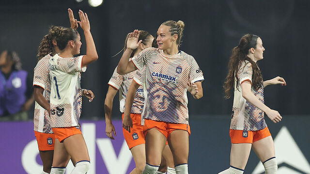 NEW YORK, NEW YORK - JULY 15: Rose Lavelle #16 of NJ/NY Gotham FC celebrates scoring her team's first goal with team during the NWSL match between NJ/NY Gotham FC and Washington Spirit at Citi Field on July 15, 2026 in New York, New York.