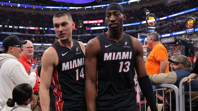 CHICAGO, IL - JANUARY 08: Bam Adebayo #13 of the Miami Heat and Tyler Herro #14 of the Miami Heat exit the court during a delay of a game between the Chicago Bulls game on January 8, 2026 at the United Center in Chicago, Illinois.