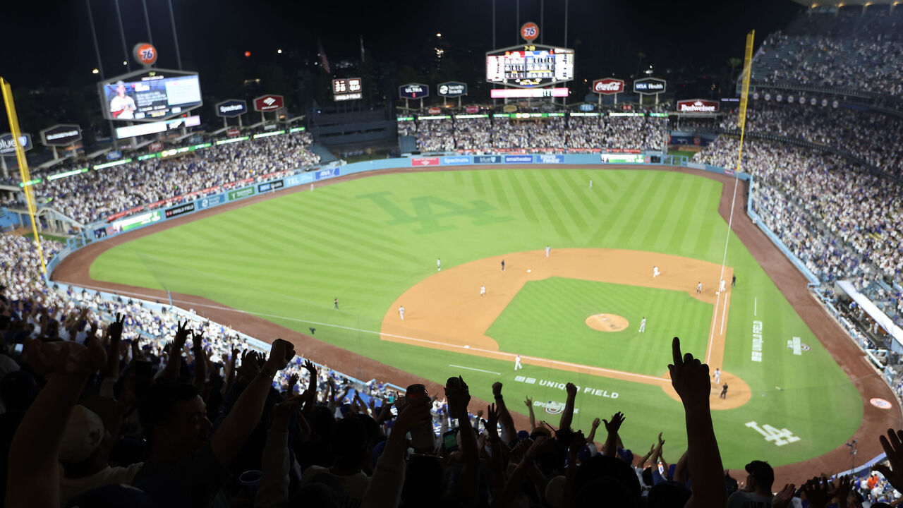 LOS ANGELES, CA - MARCH 26: A wide angle elevated view of Dodger Stadium after Los Angeles Dodgers catcher Will Smith #16 hits a home run in the bottom of the seventh inning during a game between the Los Angeles Dodgers and the Arizona Diamondbacks on March 26, 2025 at Dodger Stadium in Los Angeles, California.